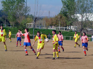 Roda controlant la pilota al costat de Baena